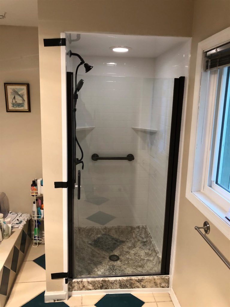 corner shower with matte black and slider
