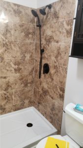 shower with roman block tile