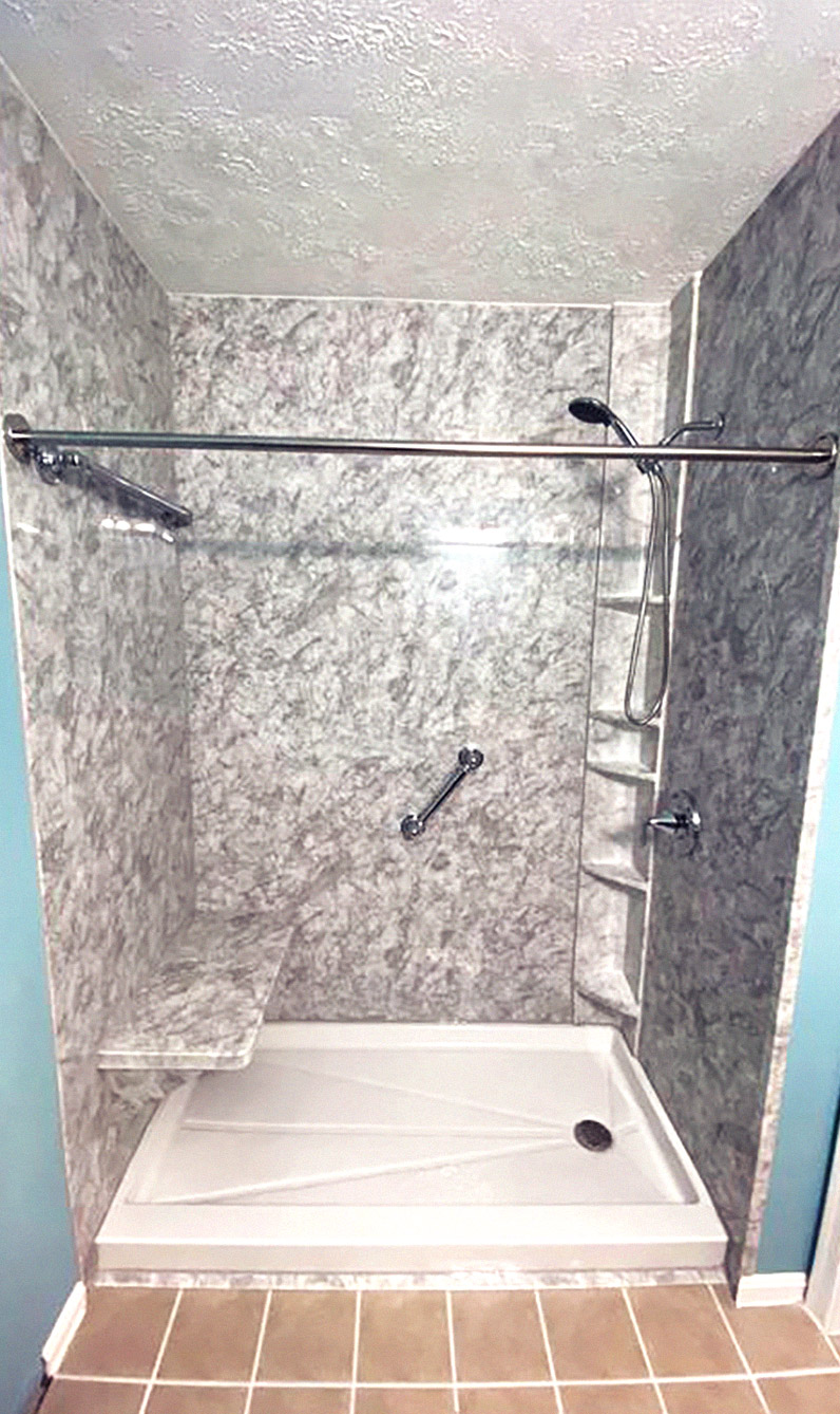 newly remodeled shower with accessibility bench