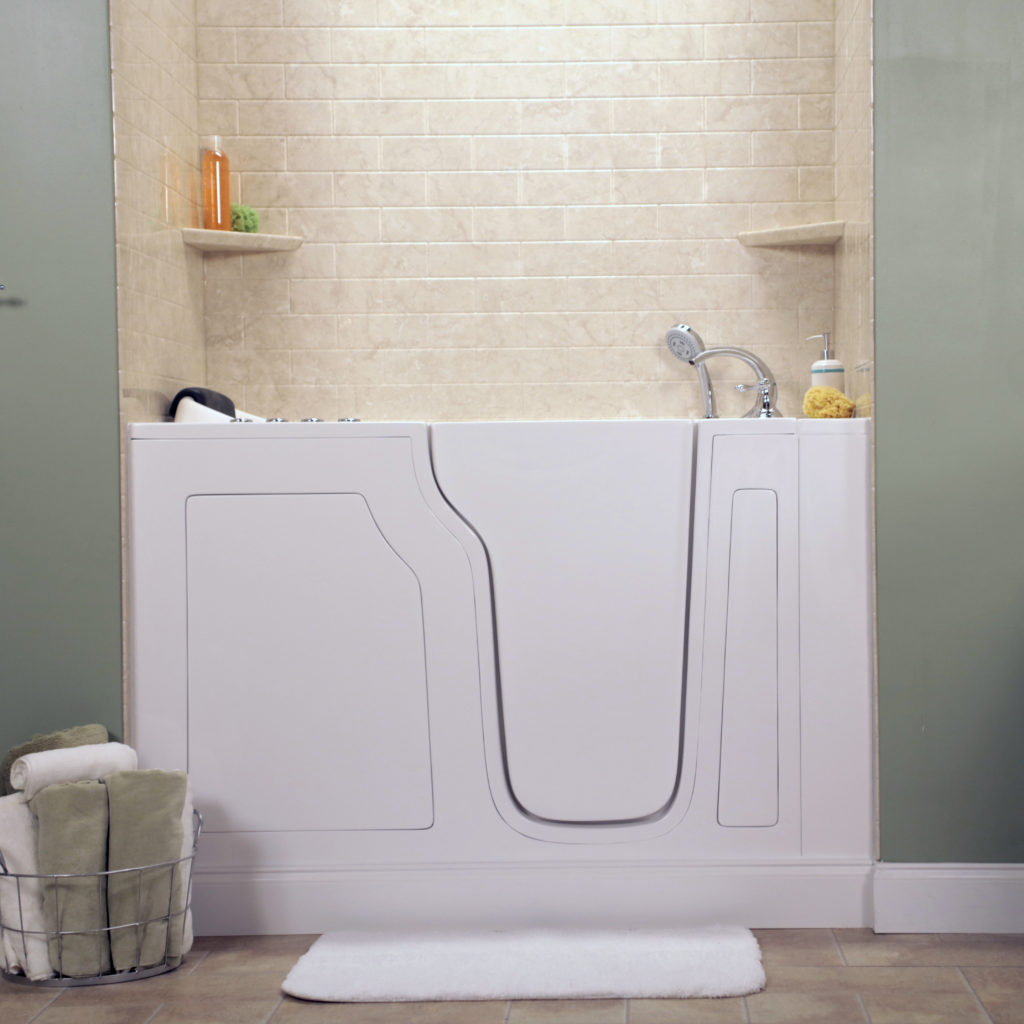 large white walk-in tub with white brick tiling