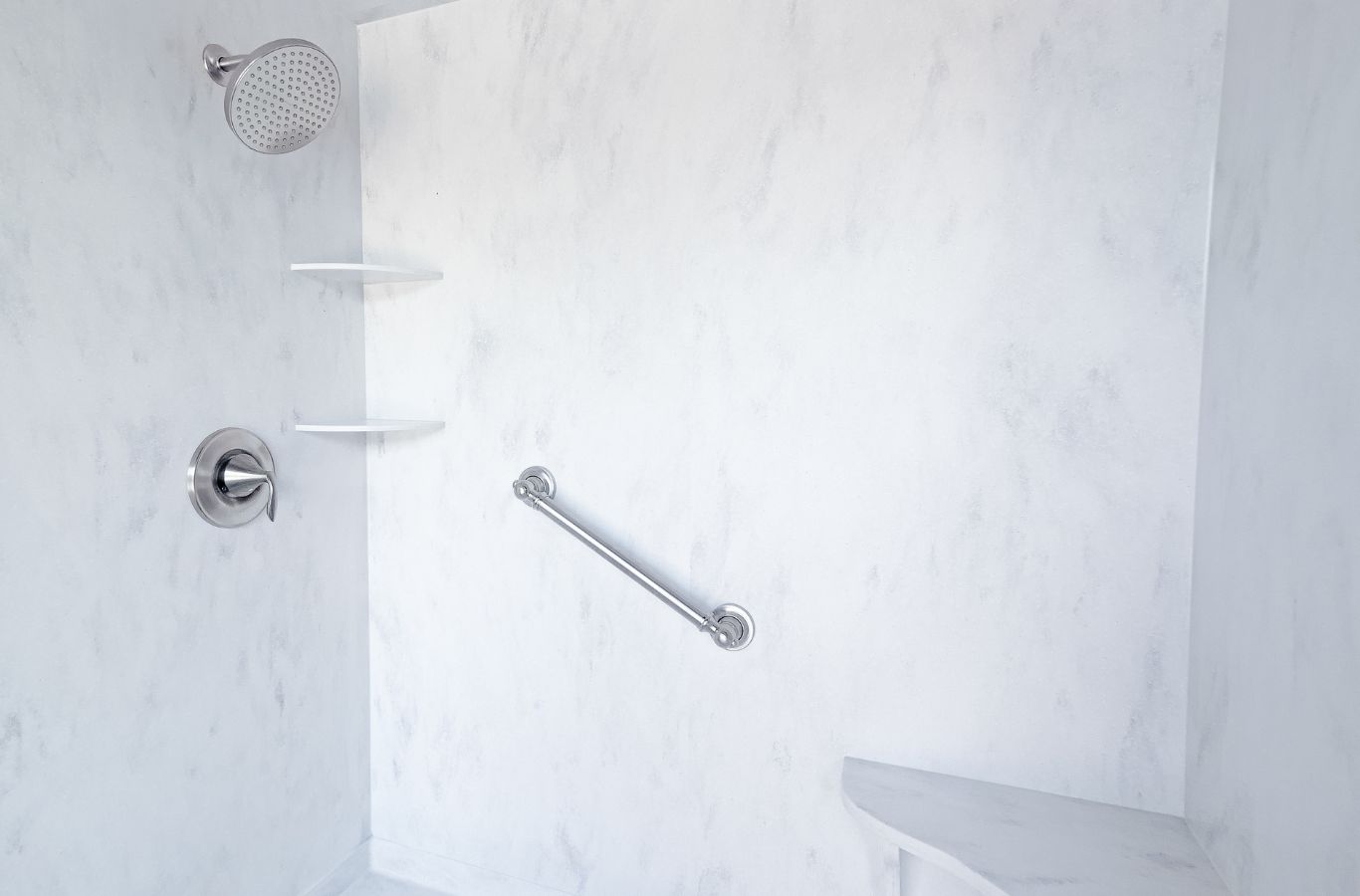 A Renken Remodeling professional showcasing the benefits of updated bathroom features in Fairfax County.