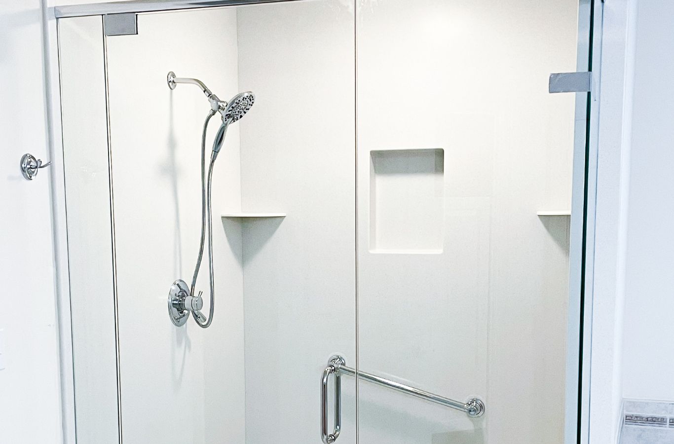 Benefits of Shower Doors in Frederick, MD by Renken Remodeling A Renken Remodeling team member delivering shower doors in Frederick, MD, demonstrating the benefits of using a local professional for this essential service.