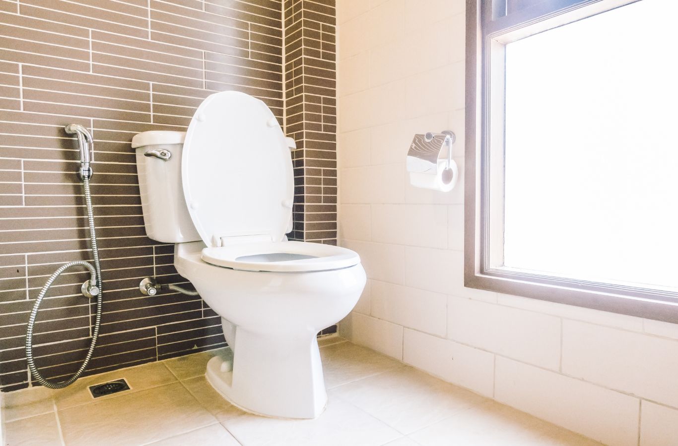 A Renken Remodeling team member delivering toilet services in Frederick, MD, demonstrating the benefits of using a local professional for this essential service.