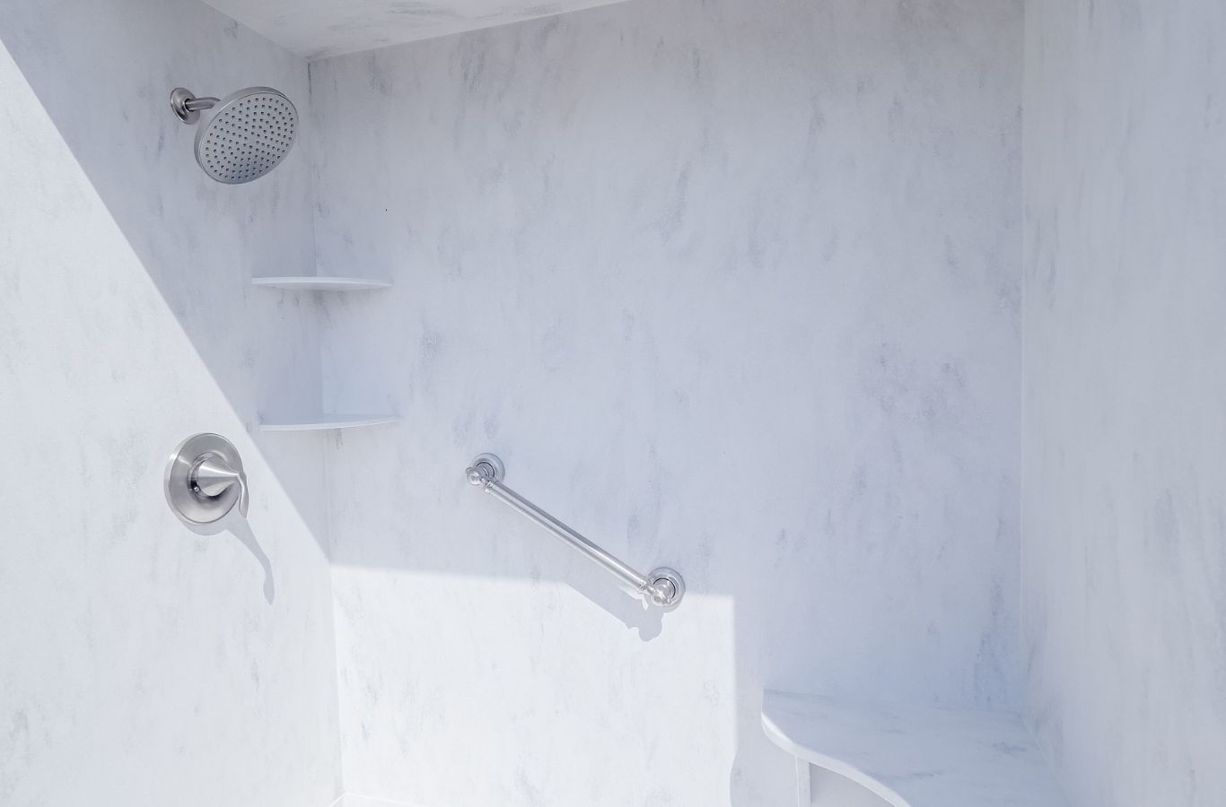 A Renken Remodeling technician completing a full bathroom renovation in Harwood, MD showing precision and craftsmanship.