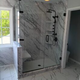 Calcutta-Shower-Rainhead- with-Custom-Glass-Knee-Wall